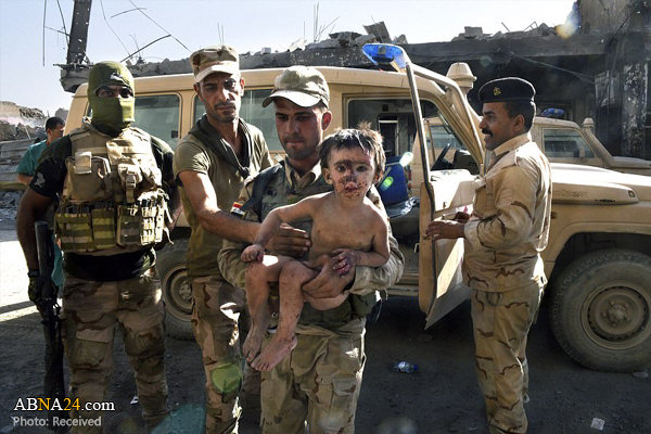 نجات معجزه‌آسای سه کودک عراقی از زیر آوار در موصل + تصاویر