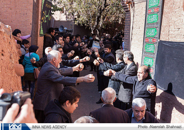 Locals jingle rattles on Tasu’a, Ashura in Abyaneh, Isfahan