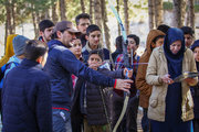 برگزاری مراسم کمک‌های مومنانه خانواده تیراندازی با کمان