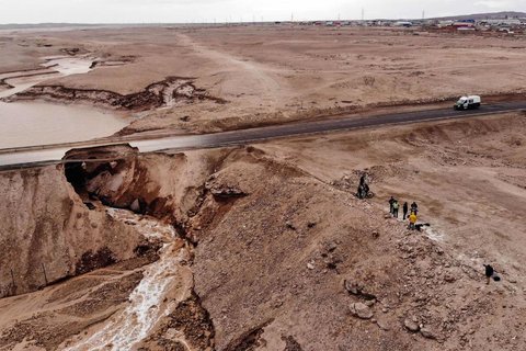 An aerial view of a flooded area near the Chuquicamata mine, the largest open-air copper deposit in the world. The state-owned mining company Codelco suspended operations due to heavy rains
