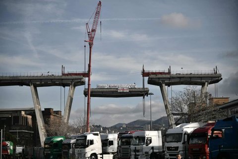 A section is removed from the collapsed Morandi bridge

