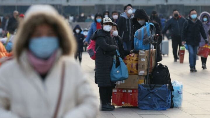 More cities locking down in China over virus outbreak fears