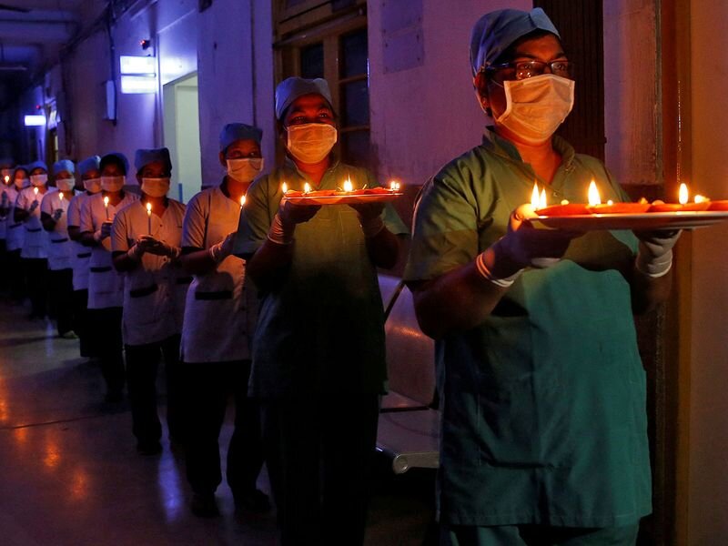India observes nationwide candlelight vigil in a show of solidarity in the fight against coronavirus