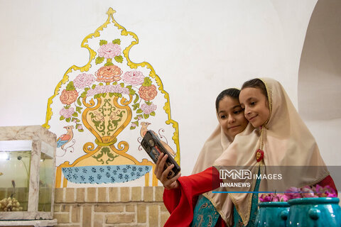  Ritual of rolling newborns in Damask roses