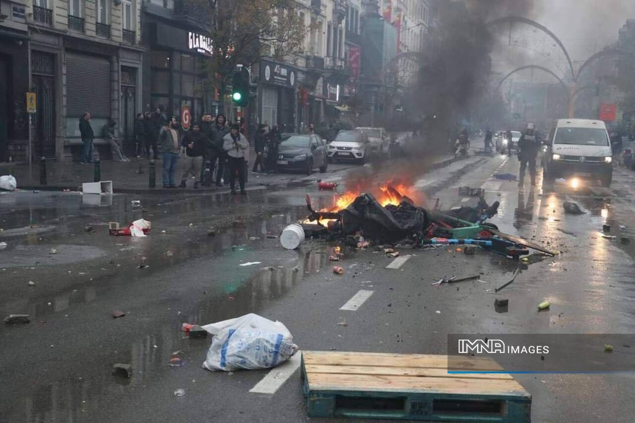 خیابانهای بروکسل پس از شکست بلژیک به آتش کشیده شد!+عکس