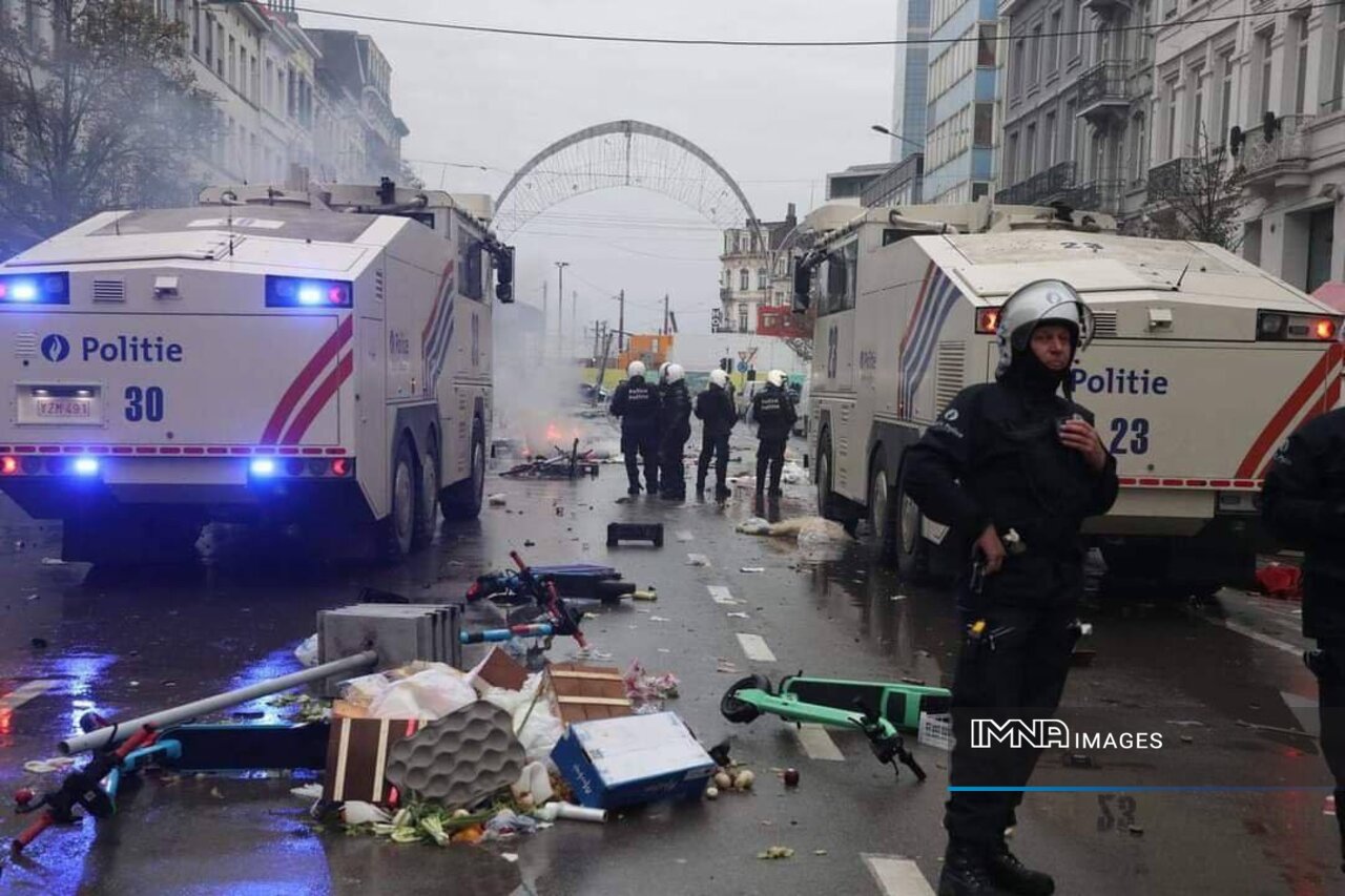 خیابانهای بروکسل پس از شکست بلژیک به آتش کشیده شد!+عکس