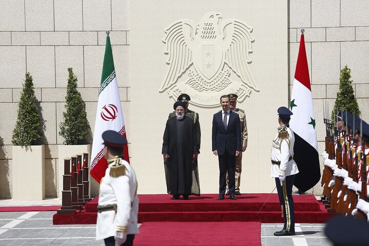 استقبال رسمی بشار اسد از رئیس‌جمهور ایران