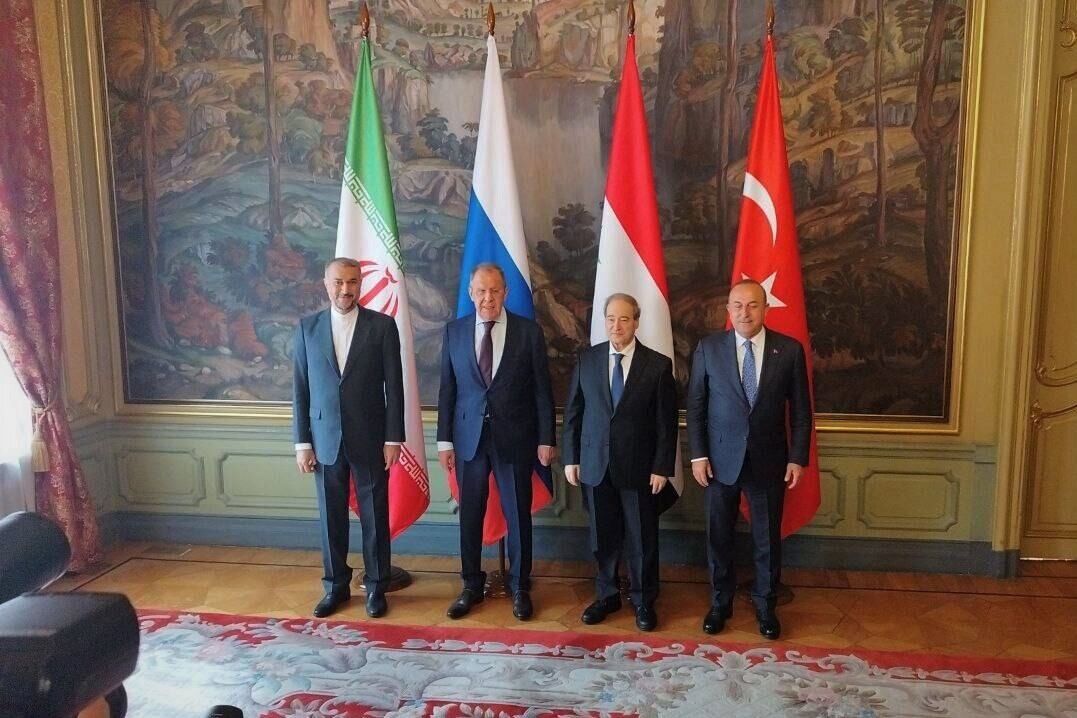 On margins of Moscow summit, Iran's Foreign Minister meets separately with his Turkish, Russian opposite numbers