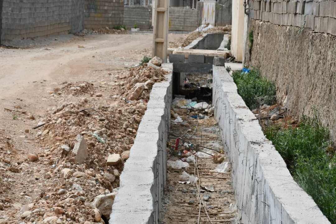 عملیات احداث کانال دفع آب‌های سطحی در محله شرف‌آباد یاسوج اجرایی شد