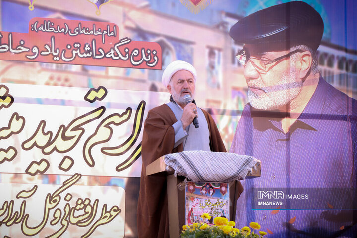 مراسم عطرافشانی و گل آرایی گلزار شهدای رهنان