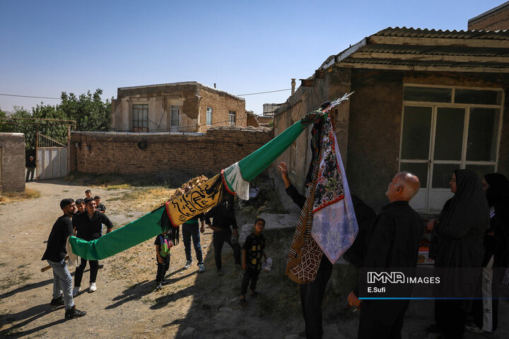 آیین علم‌گردانی در روستای هزاوه
