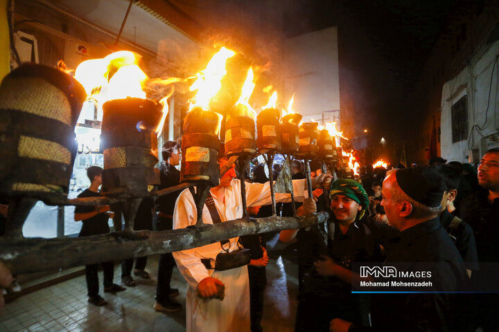 آیین مشعل گردانی نجفی های مقیم قم