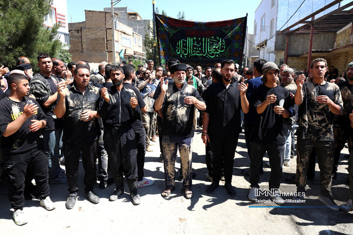 آیین سنتی گل مالی روز عاشورا در شهر دمق