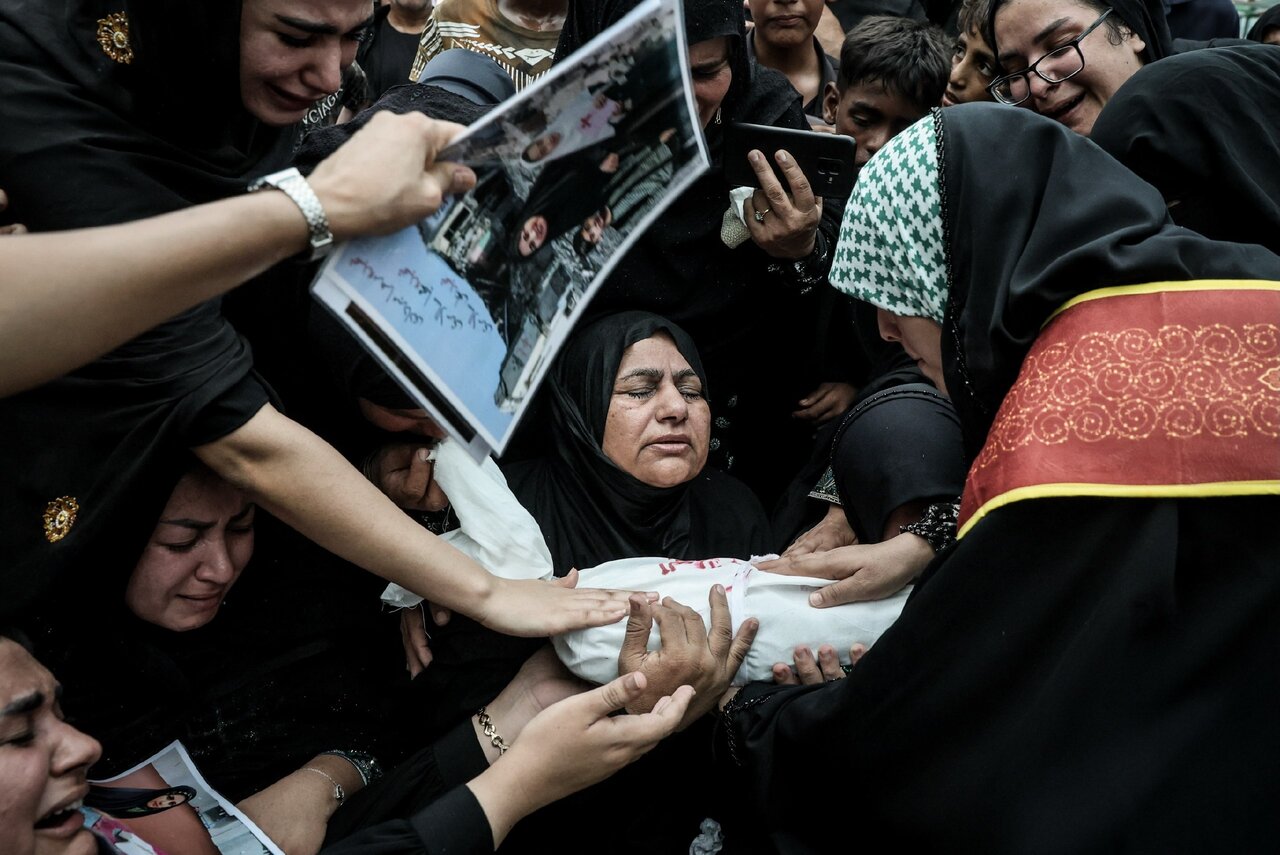 Mourners carry fragments of Minab school martyrs' remains in emotional funeral ceremony
