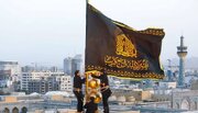 اهتزاز پرچم عزای خواهر بر فراز گنبد منور رضوی